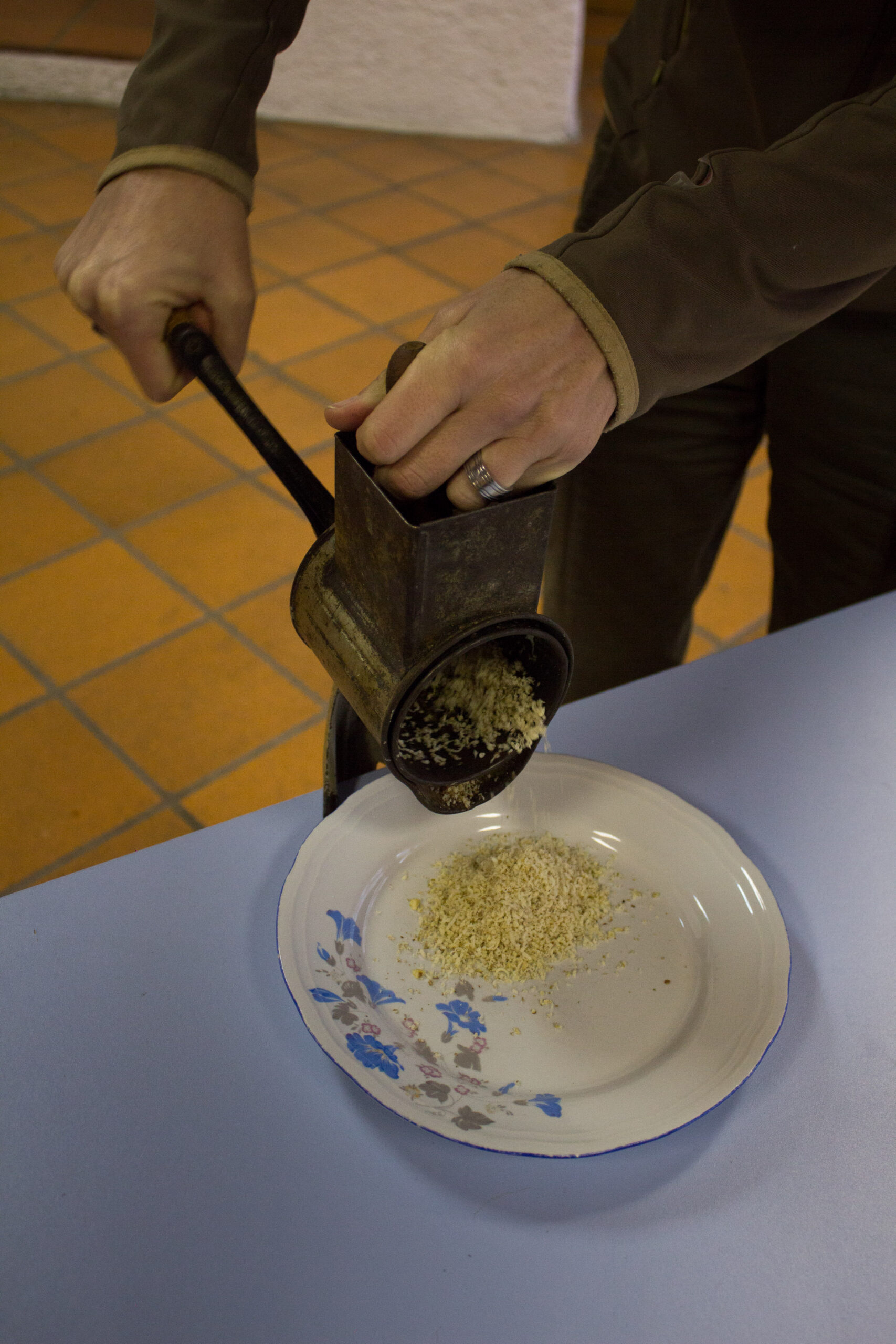Grinding nuts with a hand grinder