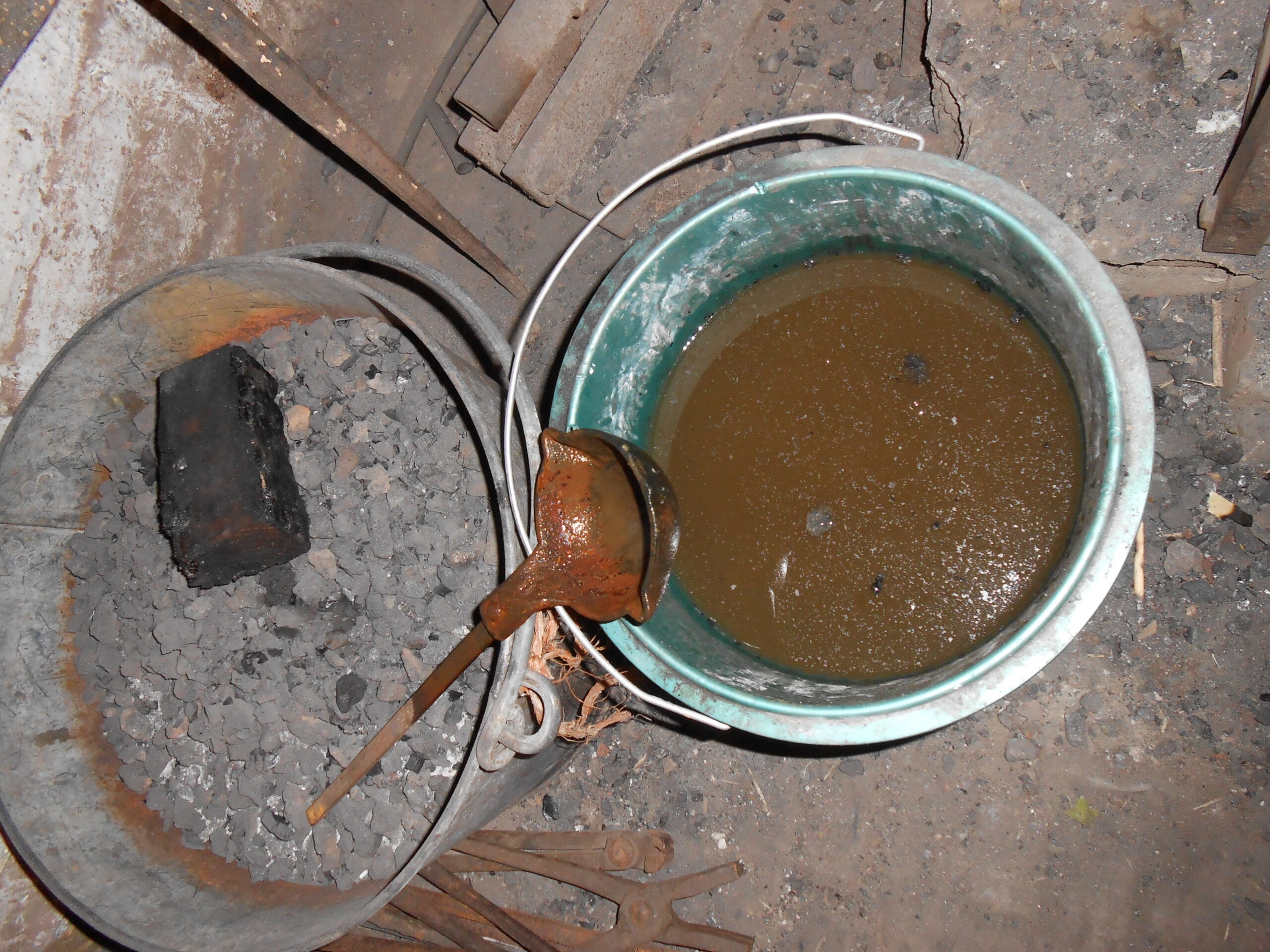 Water poured on the fire (forge)
