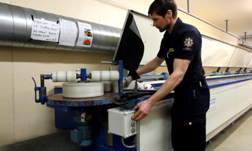 Fire Hose Maintenance machine - rolling the hose