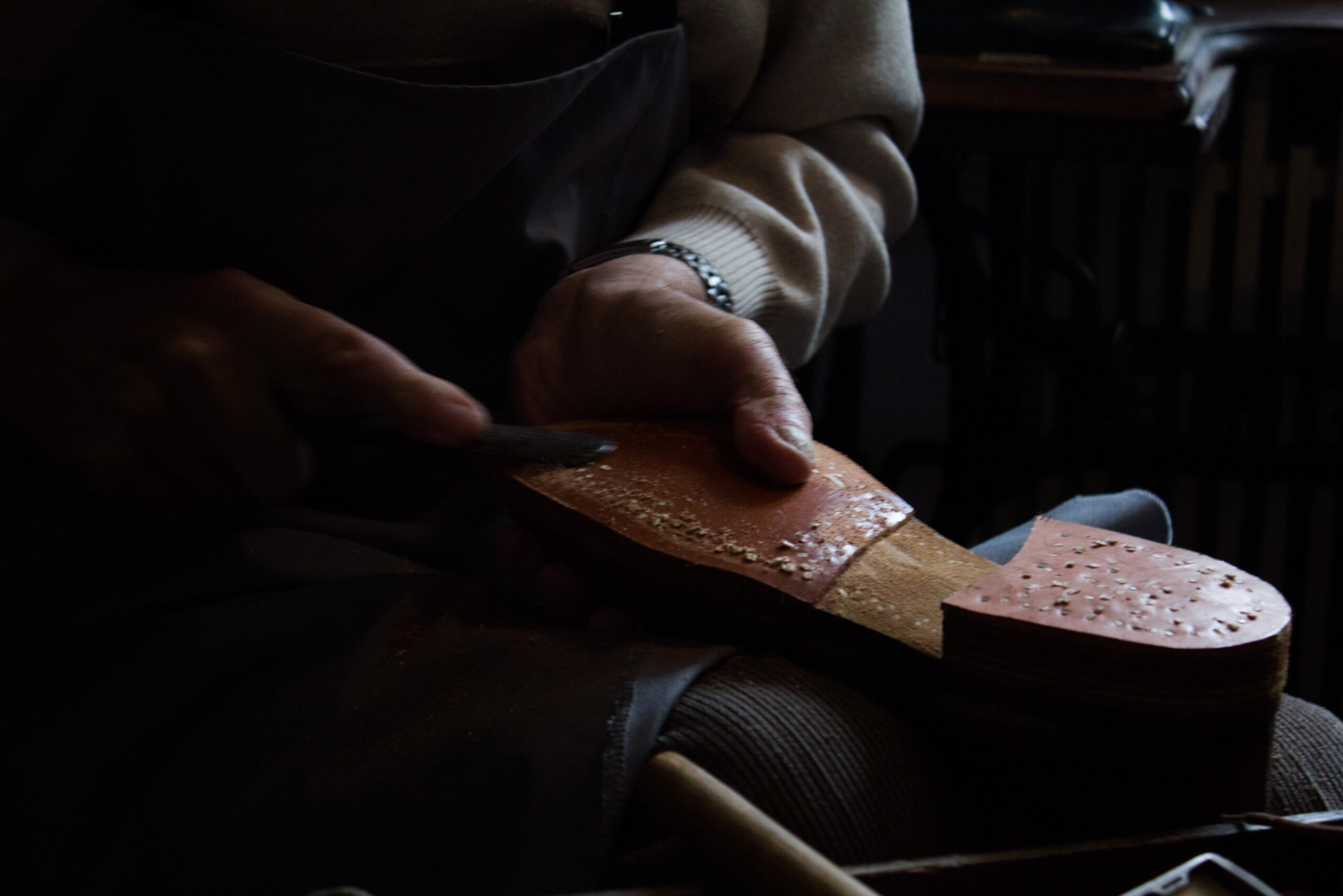 Shoemaker – Heel and edge "rasping" (grinding)