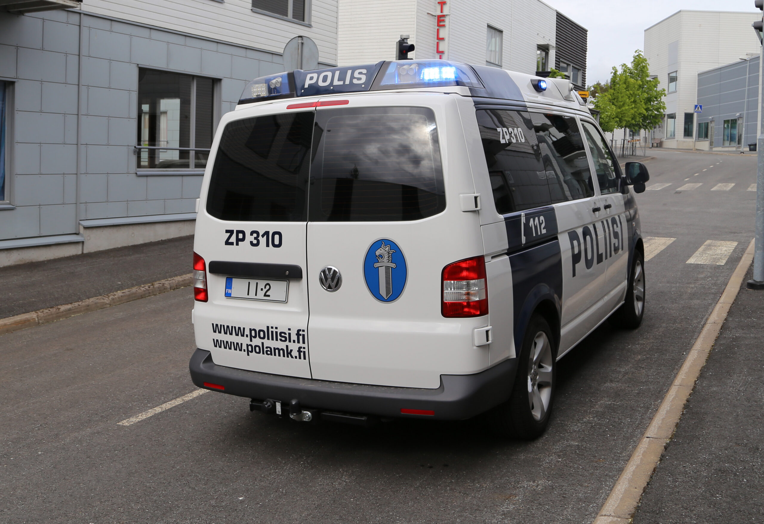 Police van, siren outside of the vehicle