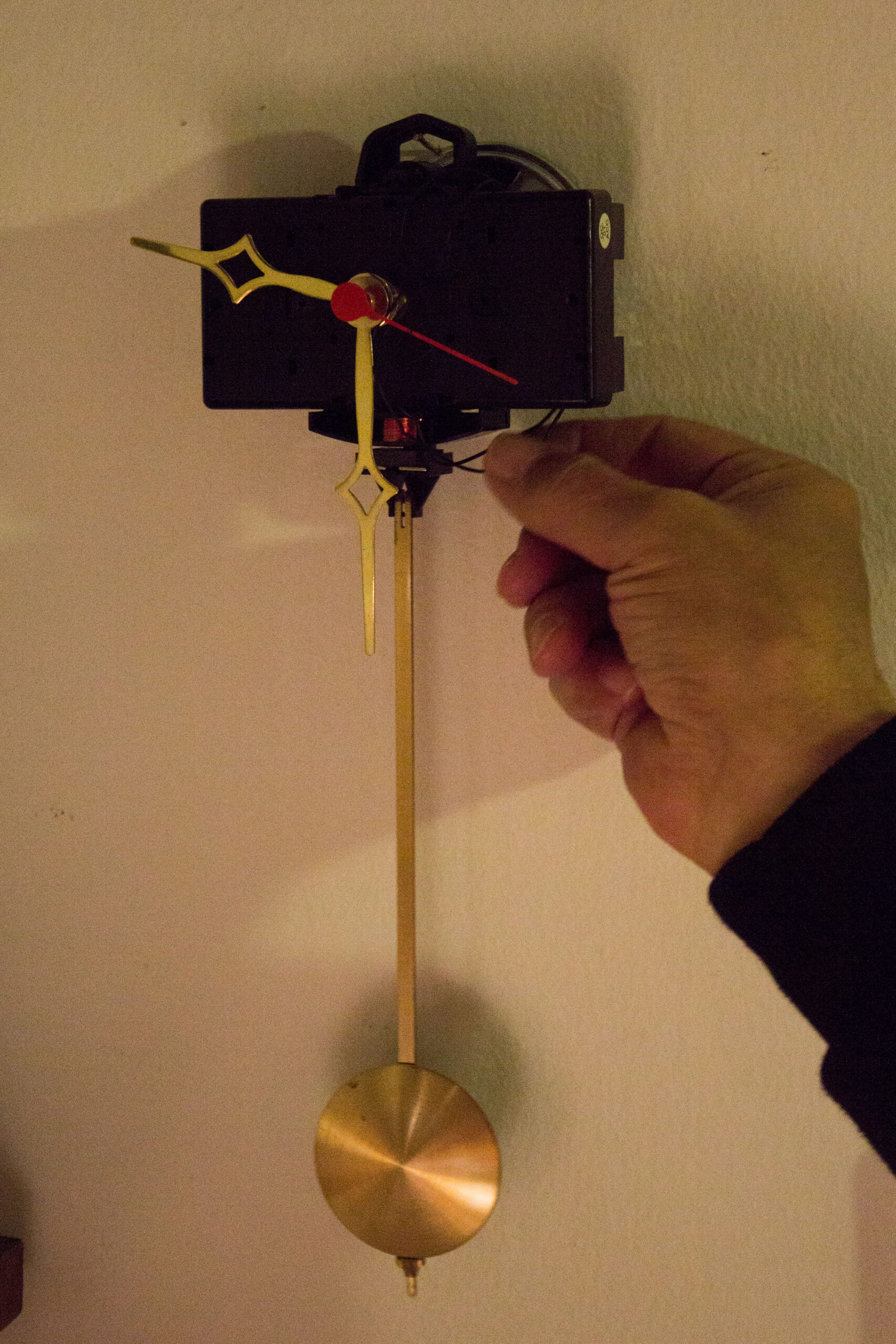 Wall clock with weight – winding