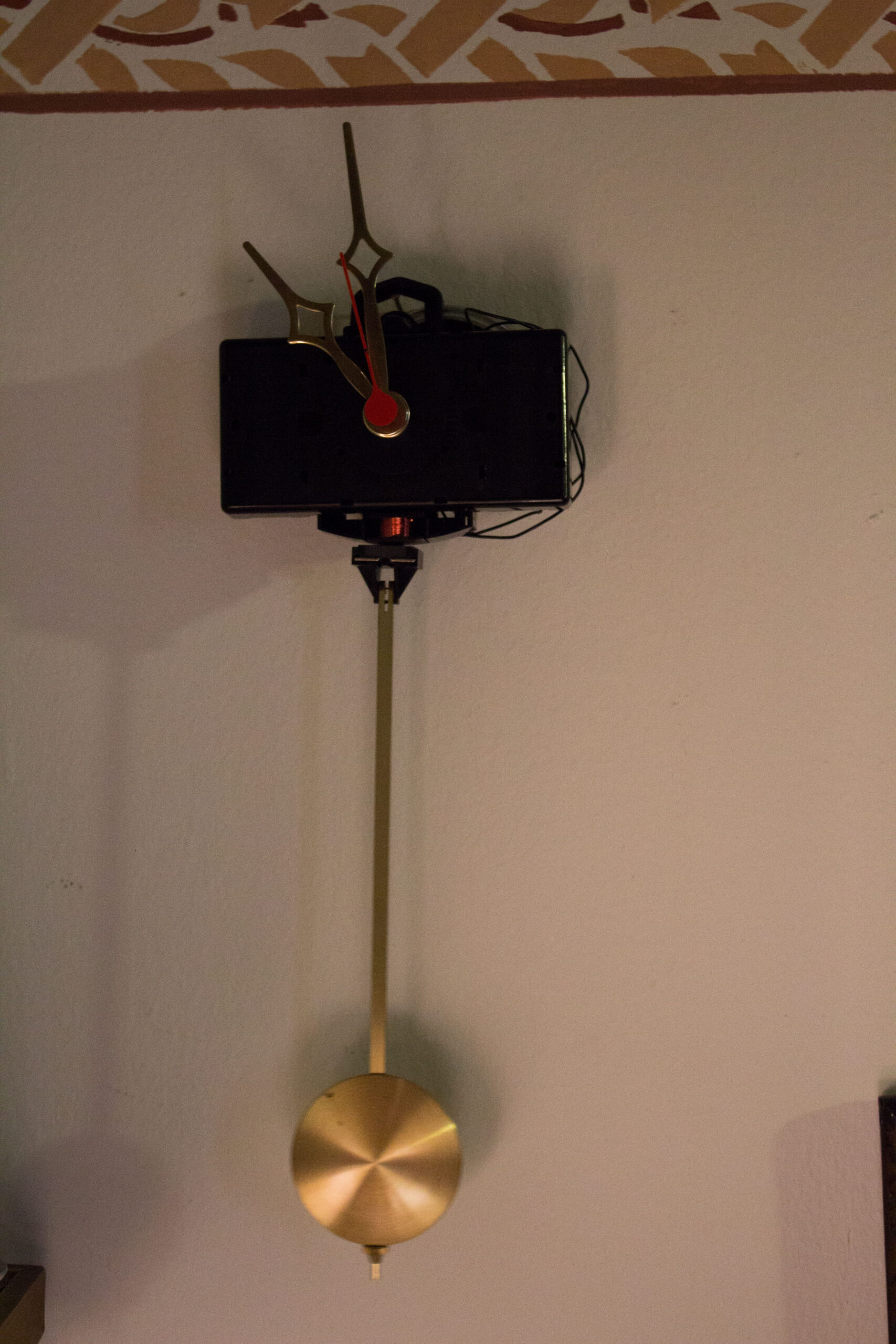 Wall clock with weight –  ticking