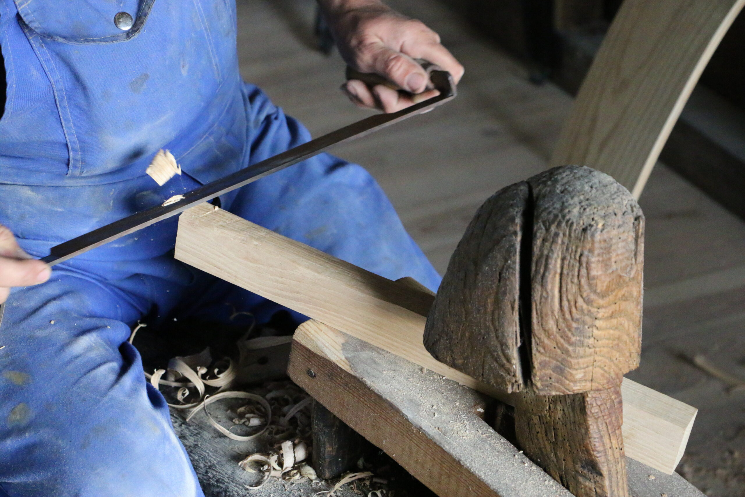 Wheelwright: carving a spoke