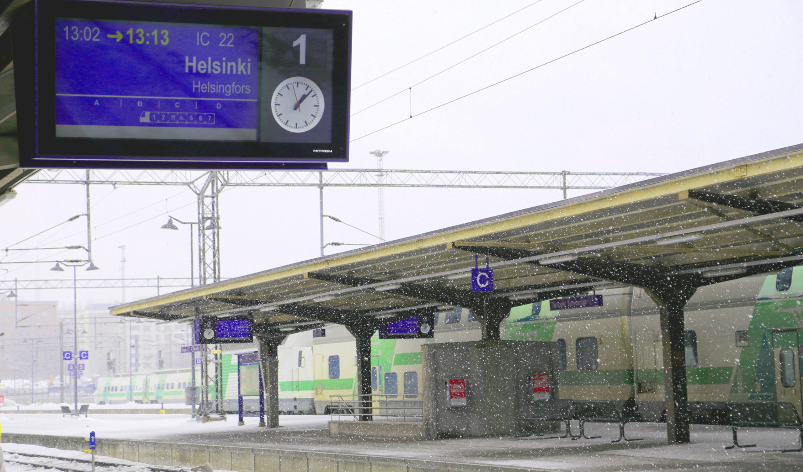 Train Stopping At The Train Station