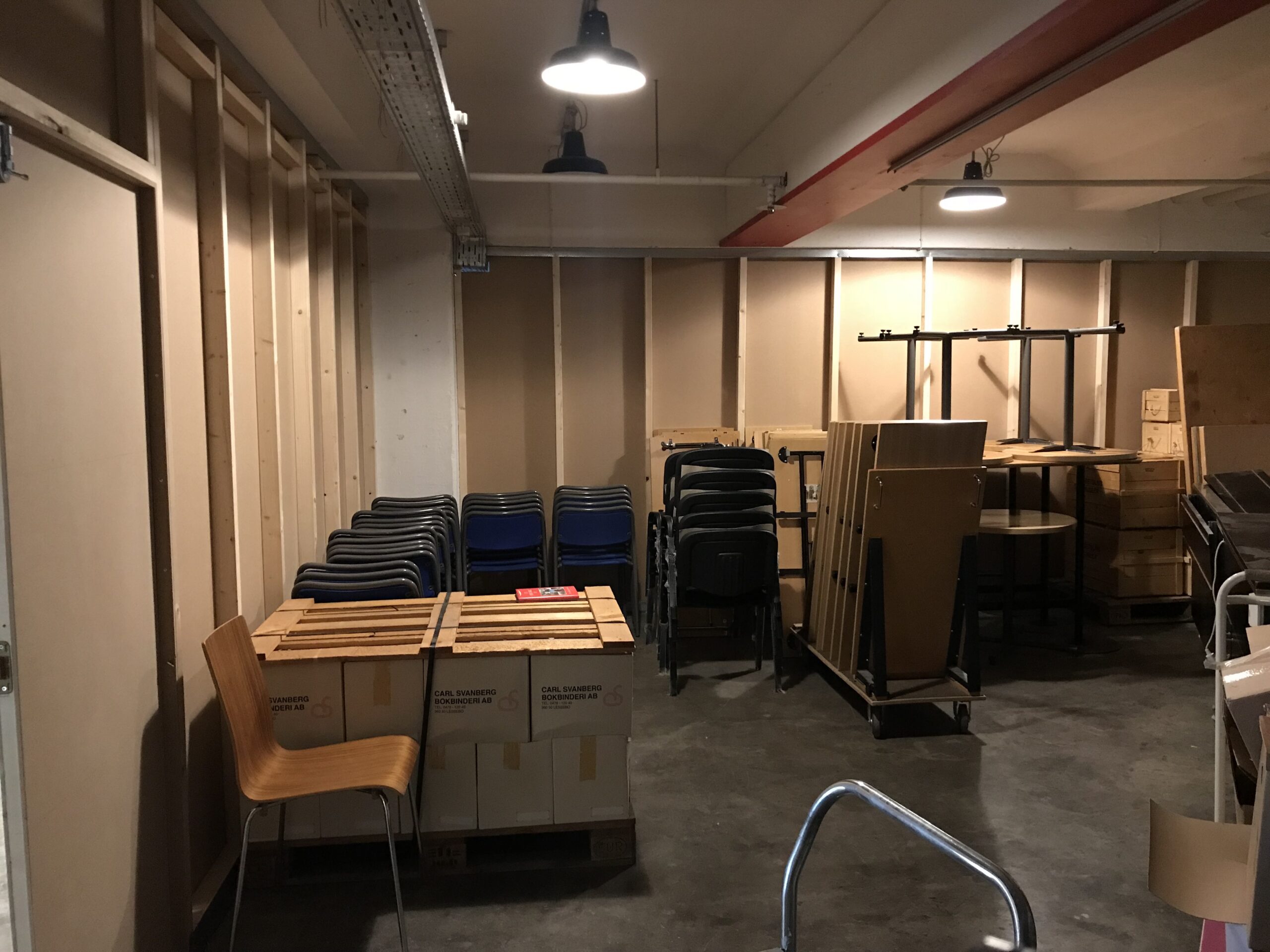 Moving chairs in the cellar