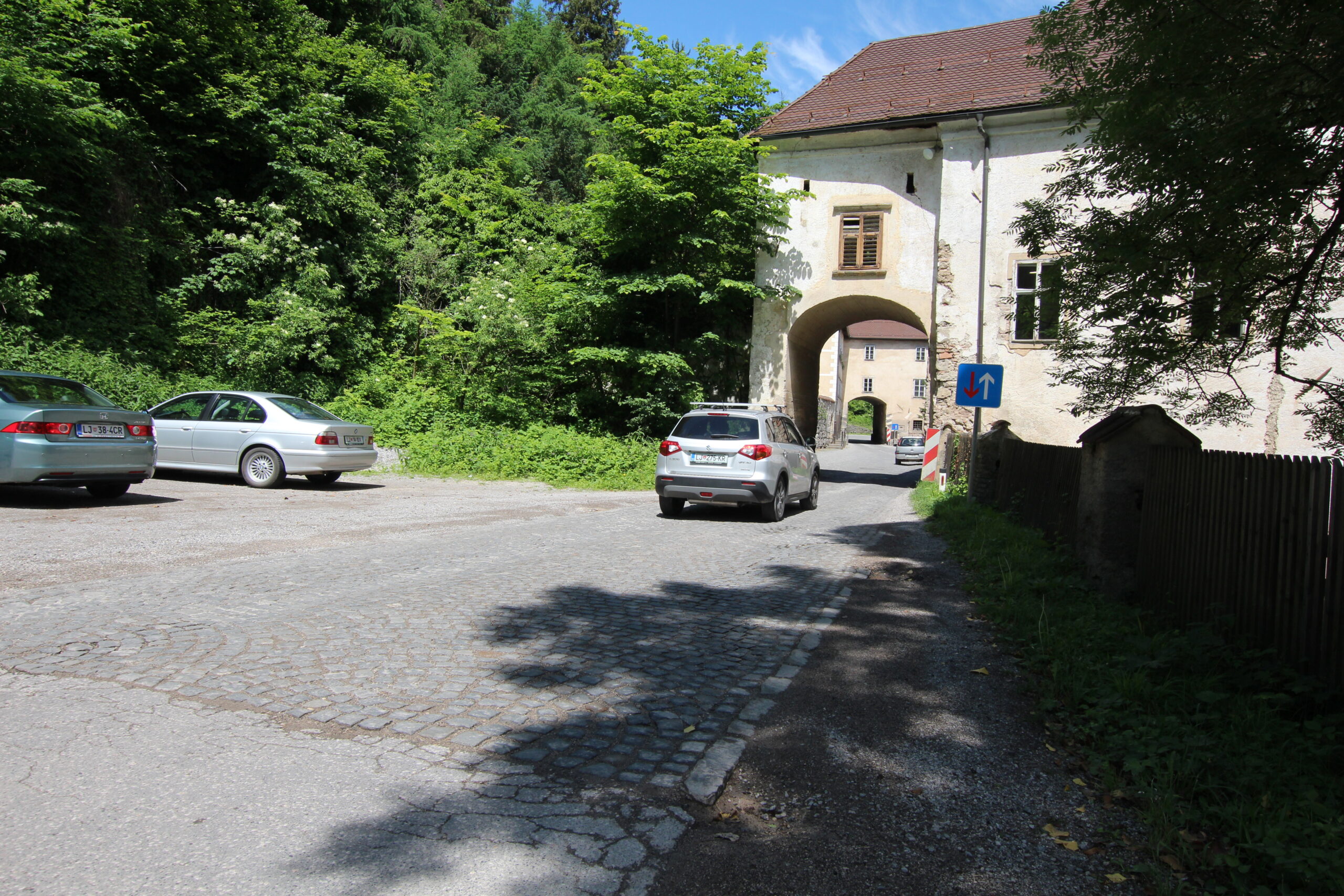 Road traffic – Asphalt and cobblestone road
