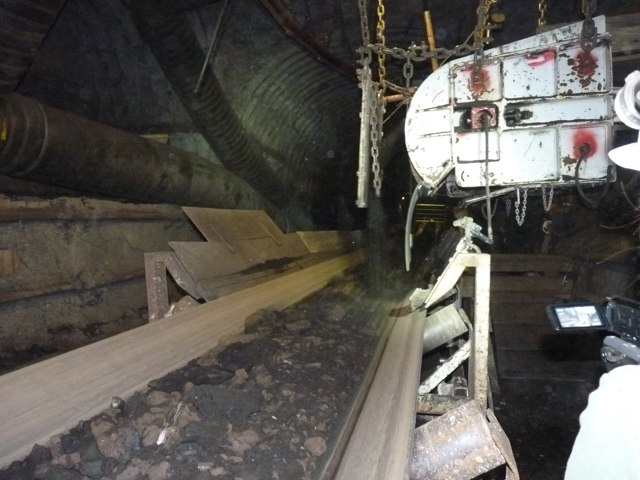 The Velenje Coal Mine, Unloading of coal from conveyor belt coming from roadway heading site to main conveyor belt
