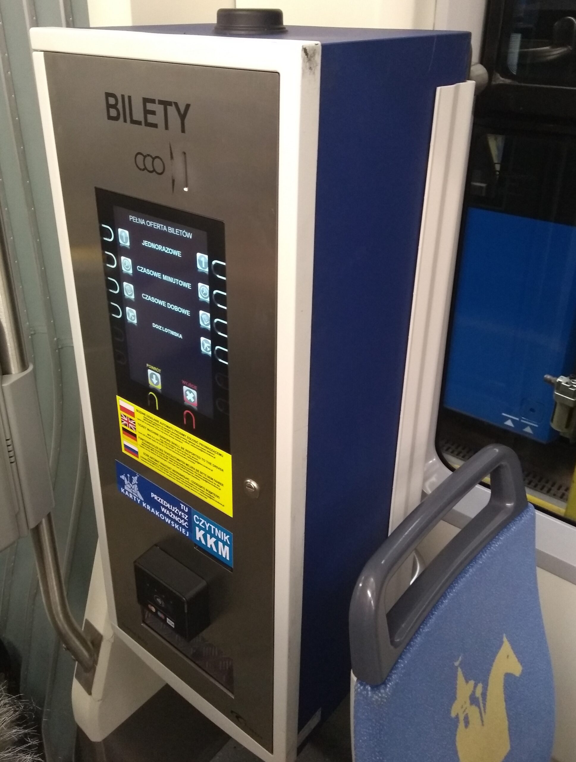 Purchasing a ticket in a ticket machine on a tram